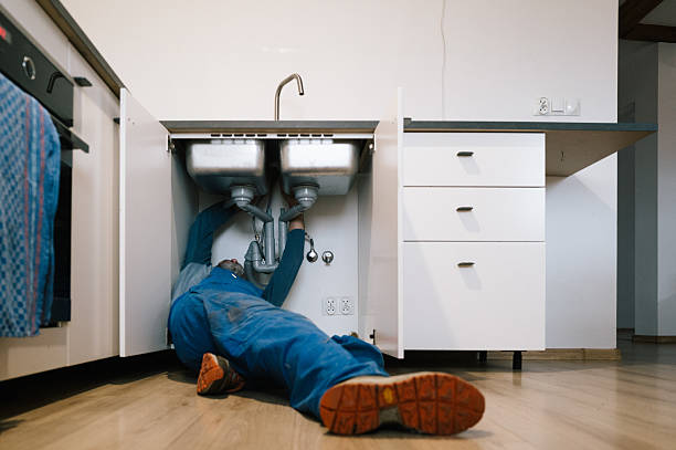 Professional Emergency Plumber technician working in Dewey, OK